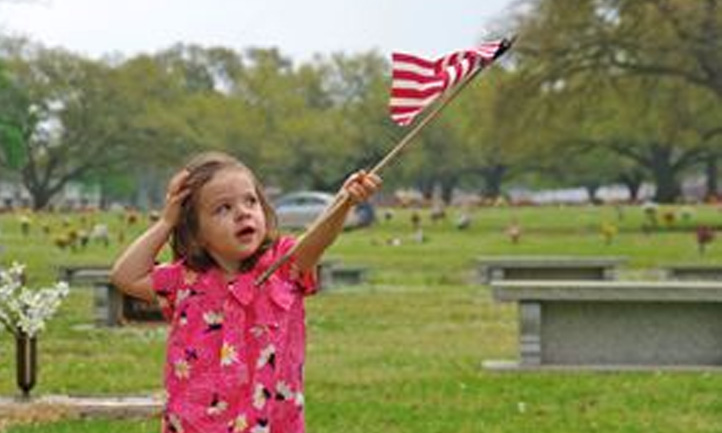 Little Girl waving flag