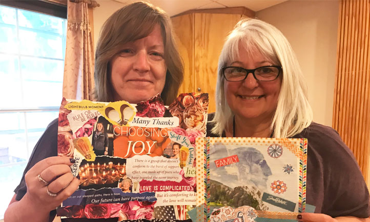 Survivors Stephanie Keegan, left, and Marilyn Weisenburg show the vision boards they created at the Sedona Women’s Retreat last year.