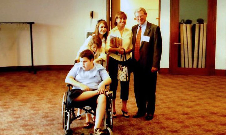 Oklahoma Sen. Jim Inhofe, right, is shown on Capitol Hill in 2006 with Nichole Haycock, second from right, and her children