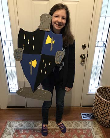 Elizabeth with her crafted coat of arms