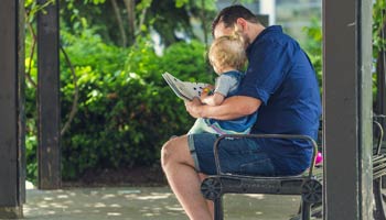 Father reading to child