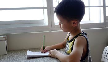 Boy writing