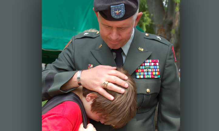 General Graham comforting child