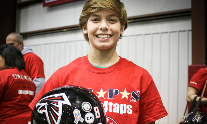 TAPS Teen with Falcons helmet