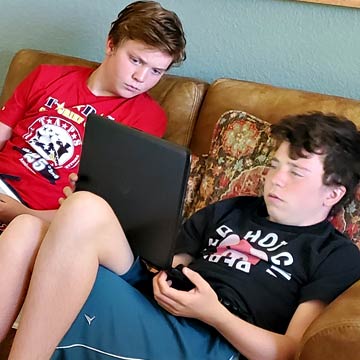 TAPS Summer Camper Teens on computer