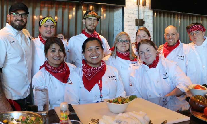 TAPS Survivors in chef jackets