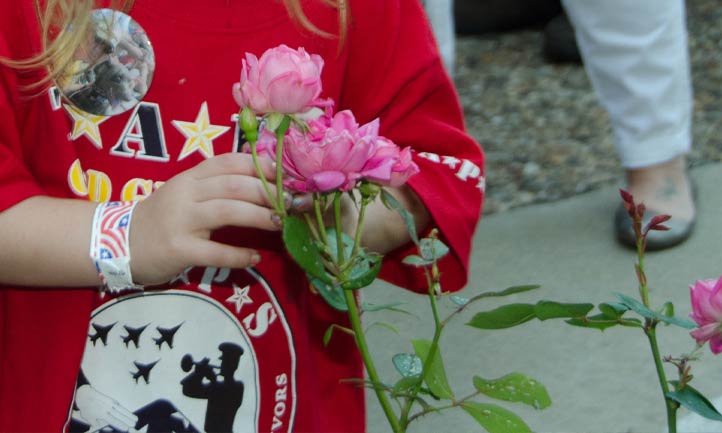 Little girl holding flowers