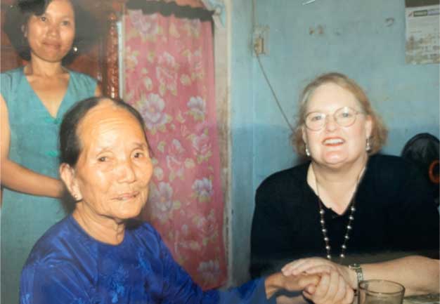 My mom, Sally, with a Vietnamese widow and her daughter in her home My mom, Sally, with a Vietnamese widow and her daughter in her home