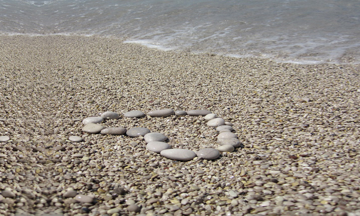 heart shaped pebbles on beach