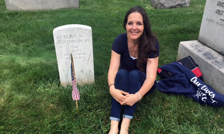 Allicia Johnson at husband's headstone