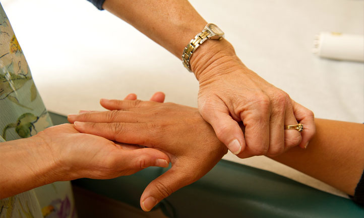 Nurse Checking a patient pulse