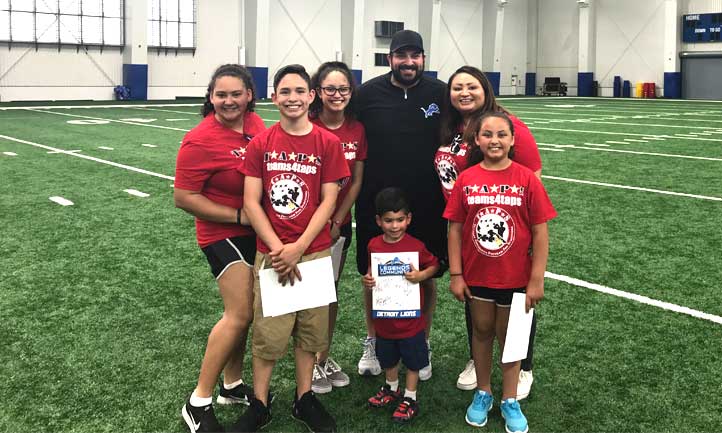 Surviving families at Detroit Lions Practice