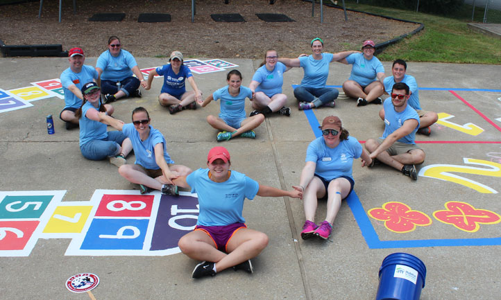 As part of a community service project with Habitat for Humanity, young adult survivors refurbished a playground in Louisville, Kentucky.