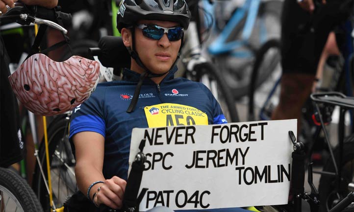 Armed Forces Classic Cyclist with Never Forget SPC Jeremy Tomlin sign