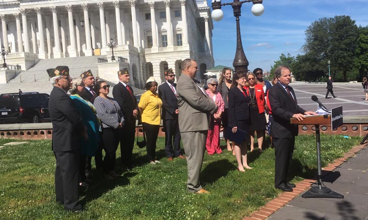 Sen. Doug Jones of Alabama, the original sponsor of the legislation to eliminate the Widow’s Tax, addresses the press on Capitol Hill