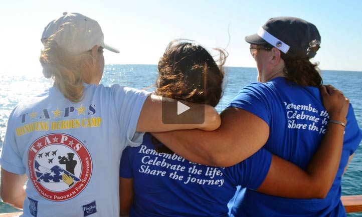 survivors arm in arm