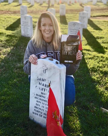 Renee sharing her book with Sam at Arlington National Cemetery