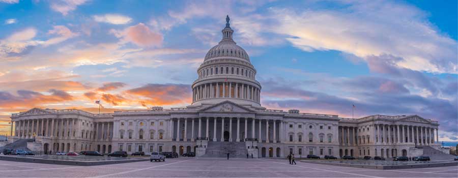 U.S. Capitol against sunset