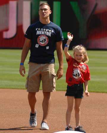 A TAPS surviving child and her TAPS Military Mentor at the Washington Nationals Game
