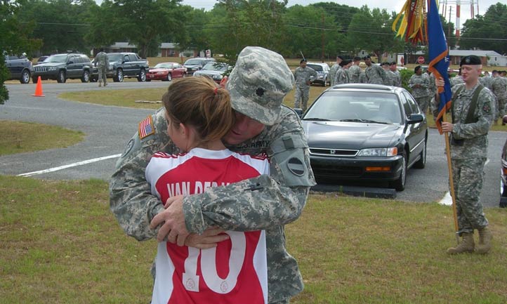 Kelly and John McHugh embrace