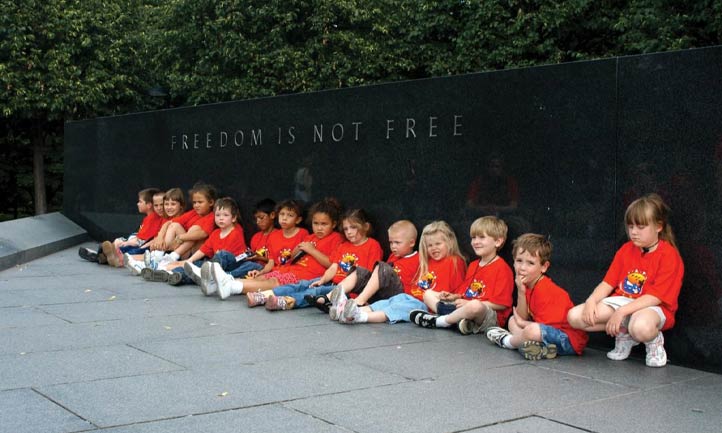 TAPS July Newsletter 2021 cover, good grief camp kids at Korean War memorial