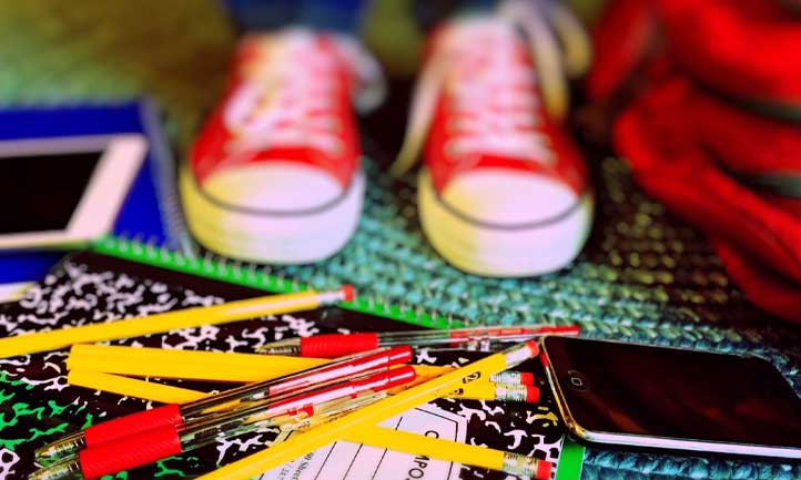 tennis shoes and books