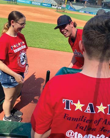 Cleveland Guardian pitcher, Shane Bieber with TAPS Families