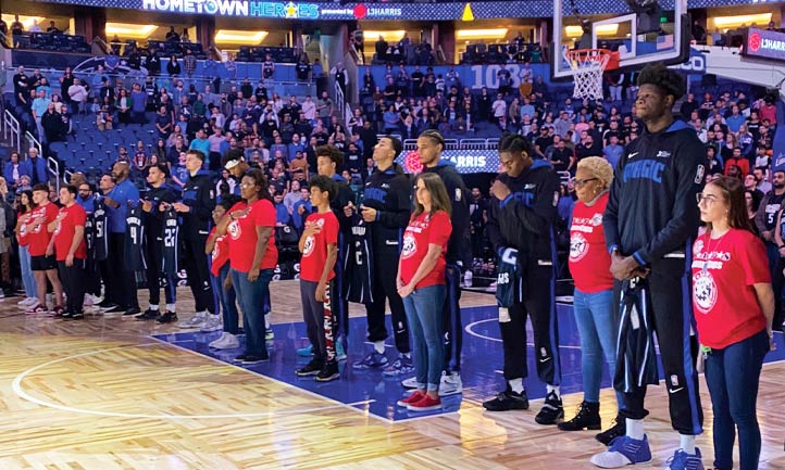 the national anthem before the Orlando Magic game