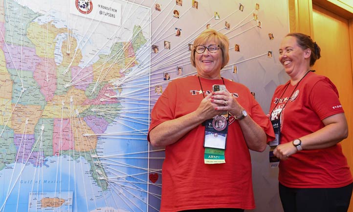TAPS women at united states map of survivor home towns