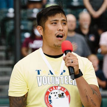 TAPS Volunteer Sings at event