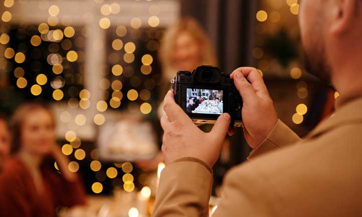 taking pictures at holiday gathering