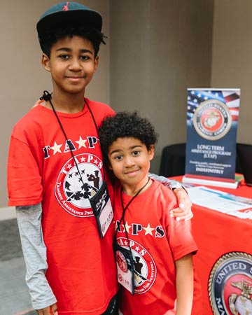 Brothers pose at Good Grief Camp