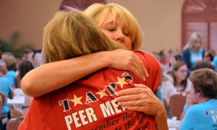 Survivors embrace at TAPS Seminar